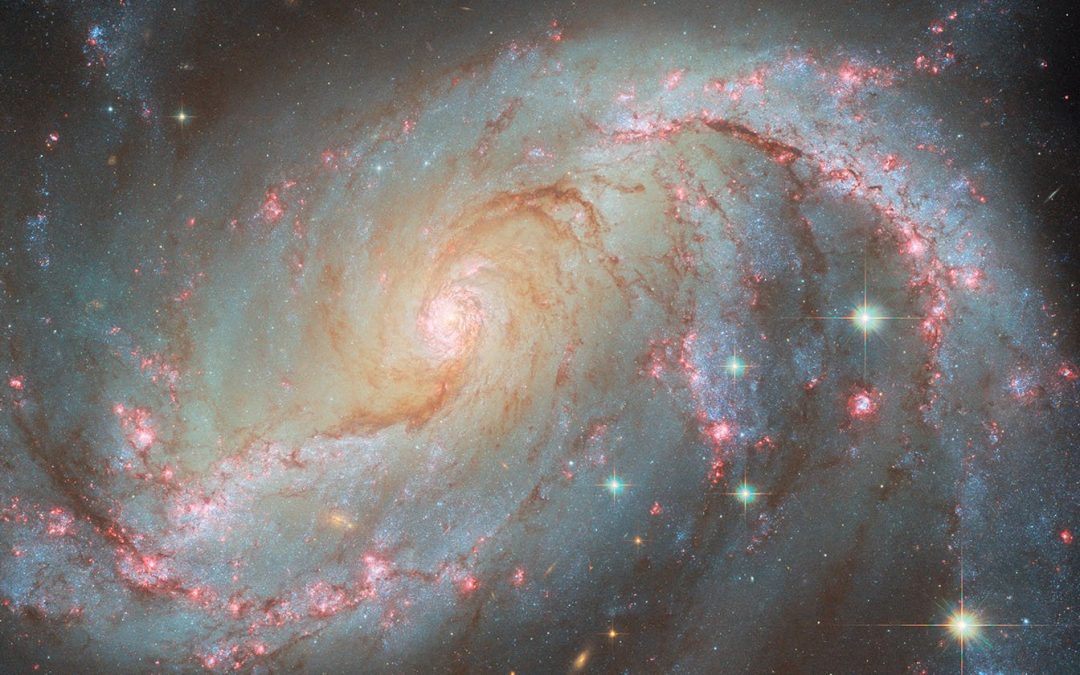 Spiral Galaxy 50 Million Light-Years Away Delivers Stellar Light Show