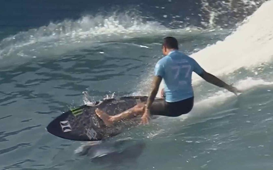 Surfer Smashes Into Photographer During Competition